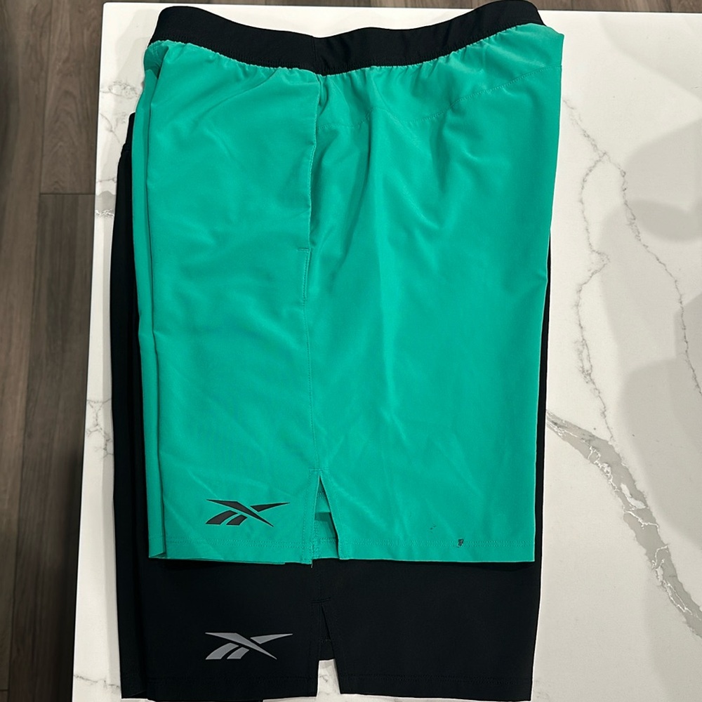 Two pairs of Reebok athletic shorts Size S